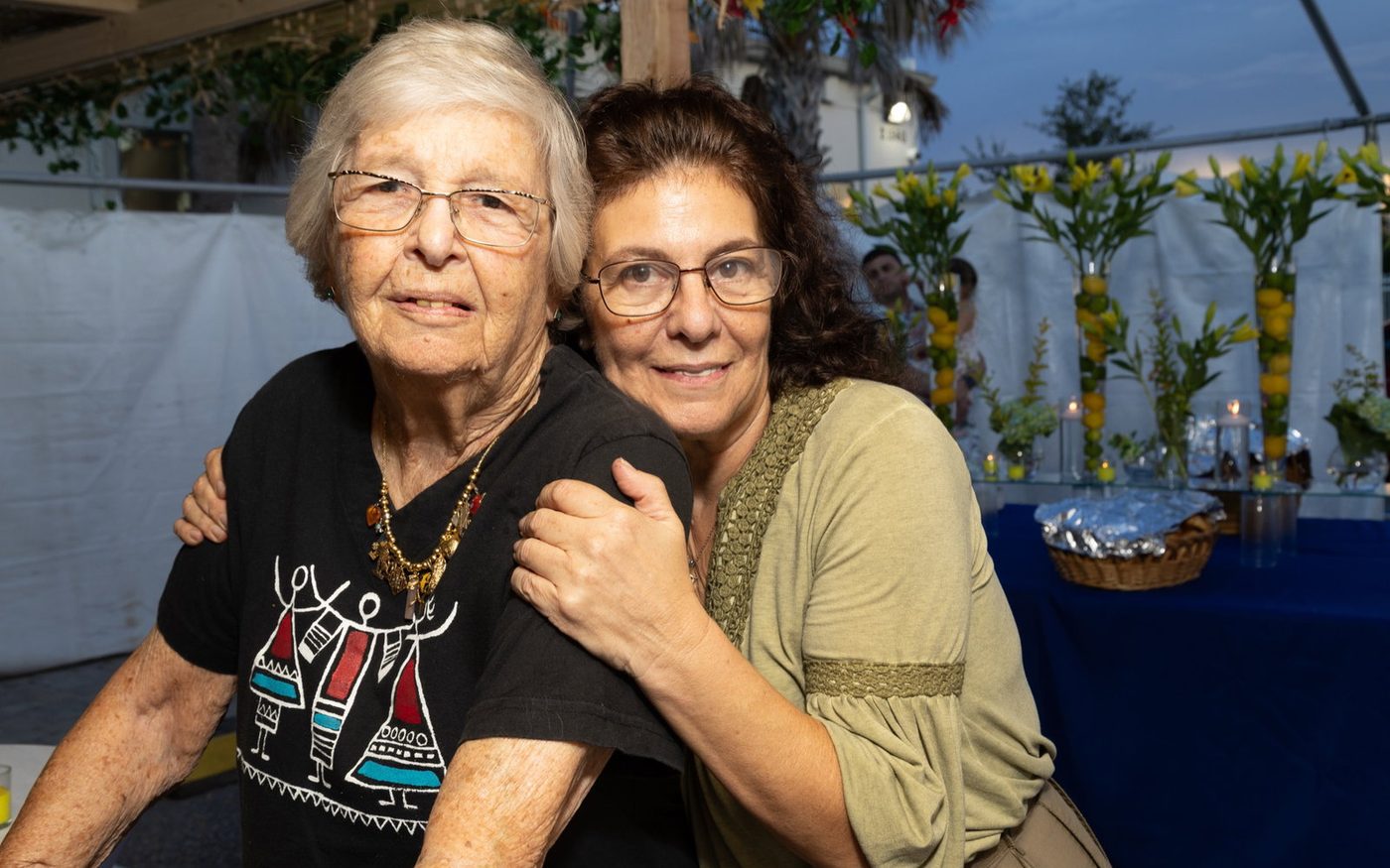 Helga Melmed with her daughter at a Chabad of Venice community event