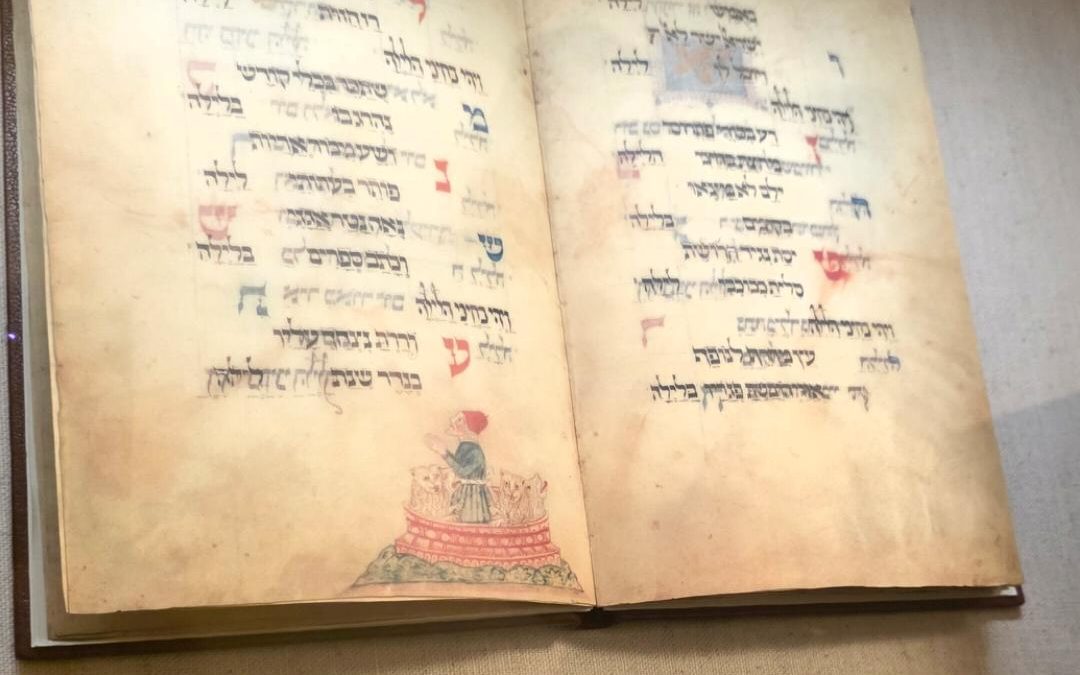 The Washington Haggadah, illuminated by Joel ben Simon in 1478, open on display among the Judaic holdings of the Library of Congress