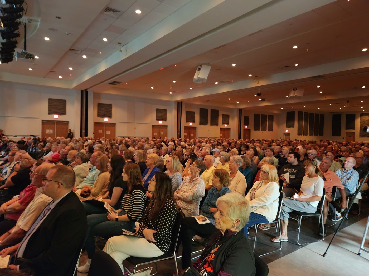 A packed hall listening to Auschwitz survivor Irene Zisblatt