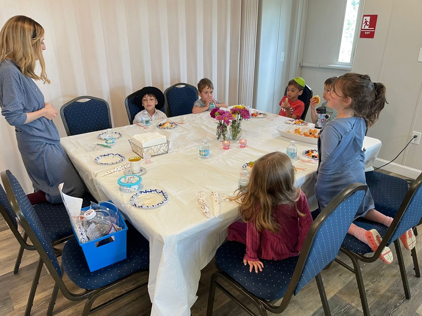 A beautifully set holiday table for the community Seder